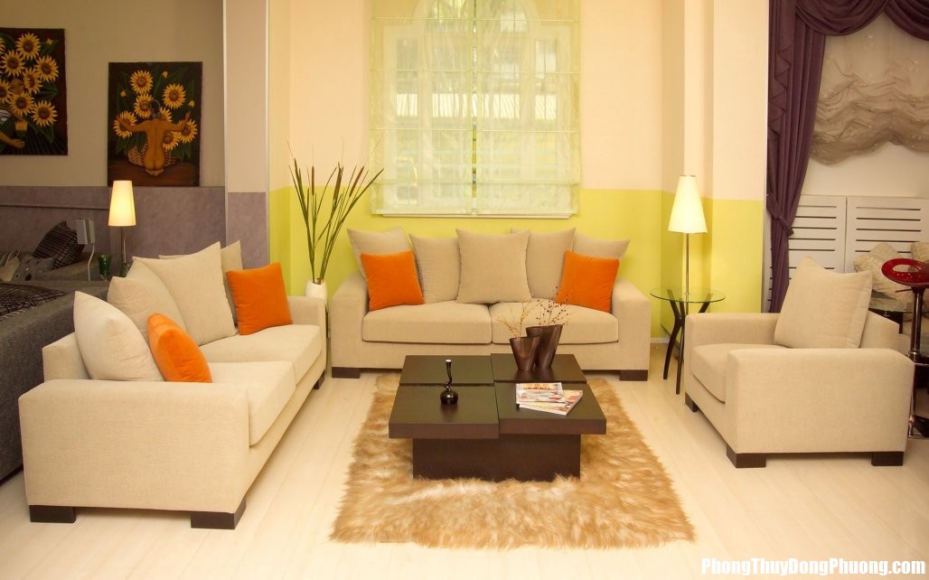 xeye catching living room with cream apart couches plus orange pillows facing wooden tables design for home sofa set inspiration.jpg.pagespeed.ic .qskh rh742 Những kiêng kị cần ghi nhớ khi bài trí sofa trong phong thủy nhà ở